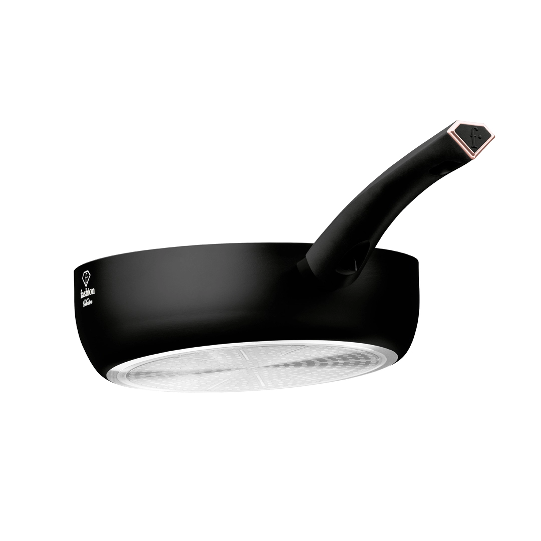 The pan seen from the side, with the polished induction base underneath