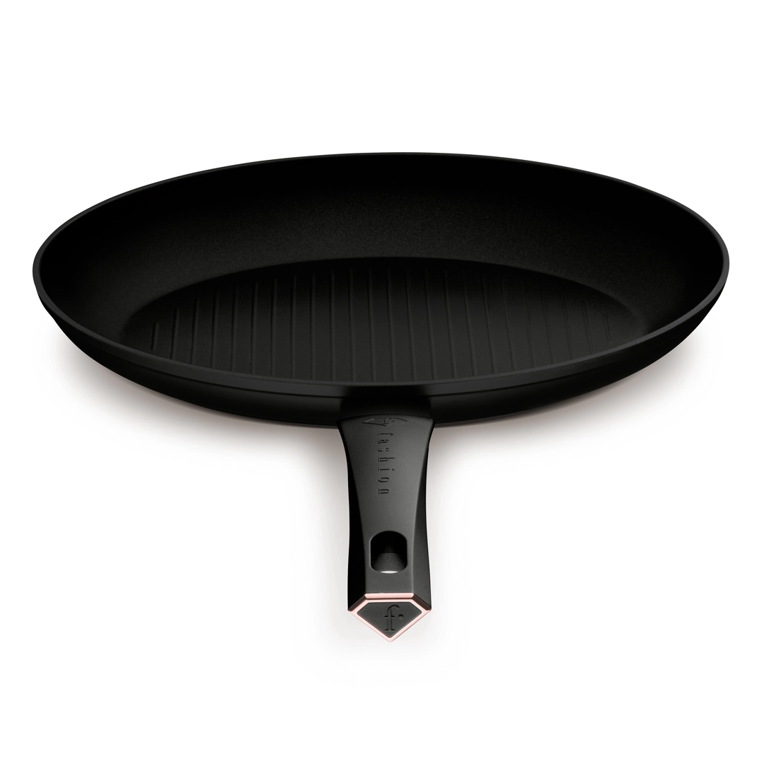 La poêle à poisson vue de dessus, avec sa surface de cuisson nervurée