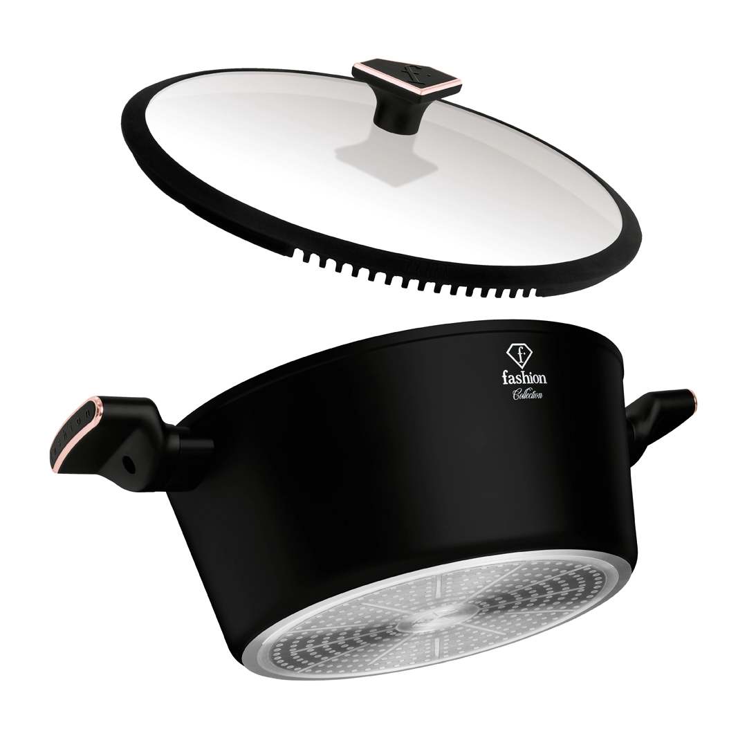 The casserole and its slotted glass lid side by side